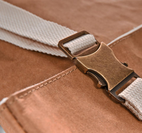 buckles on a kraft paper backpack